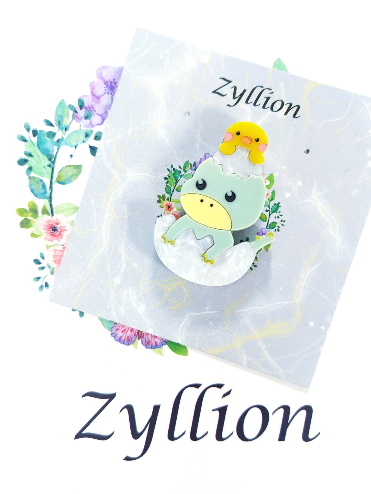 The baby dinosaur in egg Brooch